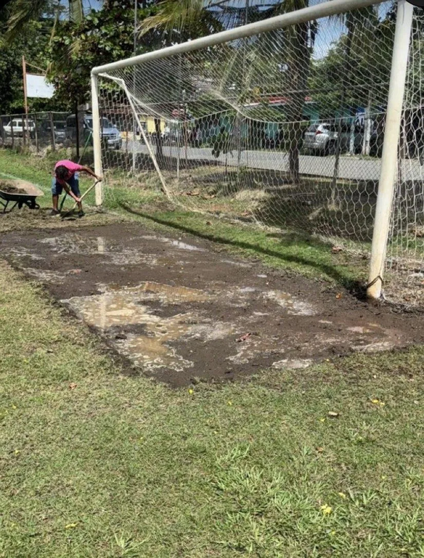 Rebuilding the goalmouth by hand