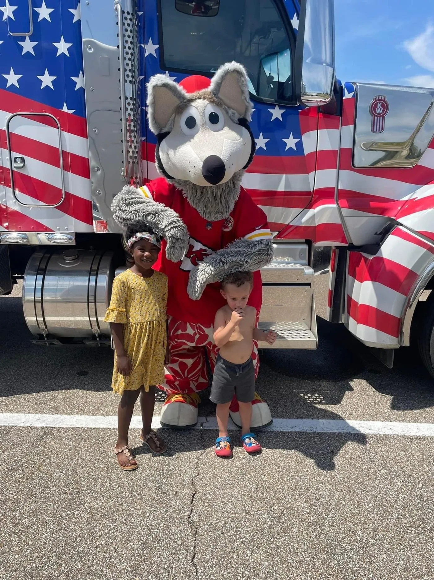 KC Wolf with two young fans at the Truckin' Back 2 School truck show