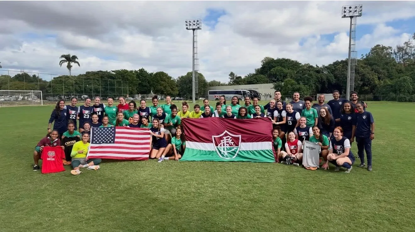 USA Sports and Fluminense womens soccer squads together after a match in Brazil